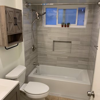 Avelar Remodeling - New tub and shower tile wall. - Flooring Near Me