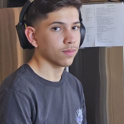 Bossman Barber shop - My son's cut you see the clean taper this is a day old after the haircut.