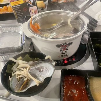 JBBQ and Shabu Shabu - Boiling hot pot: half original half mushroom flavor! Featured ingredients: oysters and seaweed - Japanese Near Me - Bay Shore, New York JBBQ and Shabu Shabu - Boiling hot pot: half original half mushroom flavor! Featured ingredients: oysters and seaweed - Japanese Near Me - Bay Shore, New York