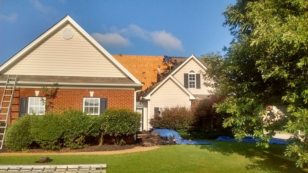 Slide of Accurate Roofing Pros