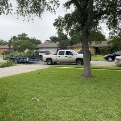 Budget Tree - Top notch equipment including a bucket truck and large trailer for hauling off the tree debris.
