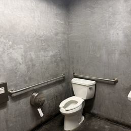 Clean all gender restroom to the back left of the restaurant.