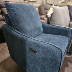 Spiller Furniture and Mattress - Power swivel recliner, blue. Ashley Signature Design