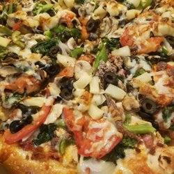 L Street Pizza - Best pizza place in Hull and all South Shore area... Very friendly owner, well done food, good price, very polite staff... High recommend.