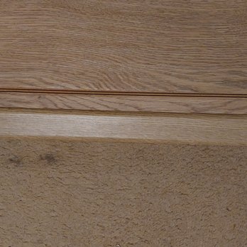 Express Flooring - Transition from one room to another with a gap. - Flooring Near Me