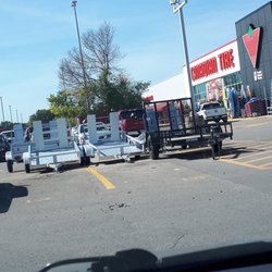 Canadian Tire - Alliston - See the nice pricey trailers on showcase  here! Six of them in total, just where handicap parking should be.  How selfish of Canadian Tire!