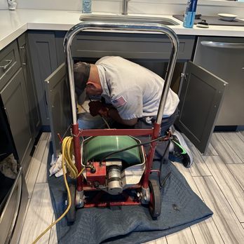 Randal's Plumbing - Technician Jack clearing a kitchen sink stoppage - Plumbing Near Me - Palm Desert, California Randal's Plumbing - Technician Jack clearing a kitchen sink stoppage - Plumbing Near Me - Palm Desert, California