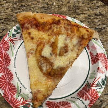 Giovanni's Pizzeria & Kitchen - Giant dough bubble on cheese slice. - Italian Near Me - Oviedo, Florida Giovanni's Pizzeria & Kitchen - Giant dough bubble on cheese slice. - Italian Near Me - Oviedo, Florida