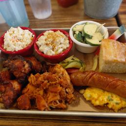 Pulled chicken, chicken wings, jalapeno/cheddar sausage b Mac n cheese, cornbread, Cole slaw, cucumber salad Pulled chicken, chicken wings, jalapeno/cheddar sausage b Mac n cheese, cornbread, Cole slaw, cucumber salad