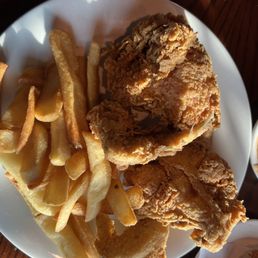 4 pieces of what they call on the menu Broasted Chicken with steak fries. 4 pieces of what they call on the menu Broasted Chicken with steak fries.