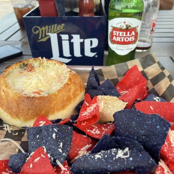 Thirsty Pony - Spinach artichoke dip with red, white and blue chips - Pizza Near Me - Sandusky, Ohio