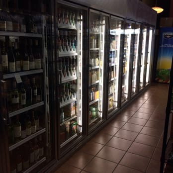 Ashbury Market - row of wine bottles in a cooler - Grocery Near Me - San Francisco, California Ashbury Market - row of wine bottles in a cooler - Grocery Near Me - San Francisco, California