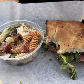 Aquino's Deli - Fig and prosciutto focaccia with pasta salad - Italian Near Me - Carlsbad, New Mexico Aquino's Deli - Fig and prosciutto focaccia with pasta salad - Italian Near Me - Carlsbad, New Mexico