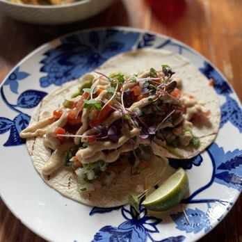 Waterdog Kitchen + Bar - Fish taco with fried cod, pico, guac, cebolada, and a spicy aioli. Very good!! - American Near Me - Warren, Rhode Island