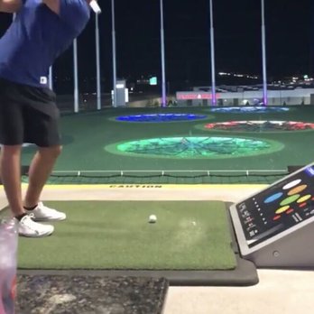 Topgolf - Night lights. Heaters above seats and tee so no problem in the winters. - New American Near Me - Thornton, Colorado Topgolf - Night lights. Heaters above seats and tee so no problem in the winters. - New American Near Me - Thornton, Colorado