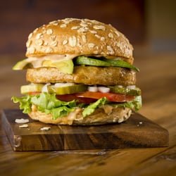 MOOYAH All-Natural Turkey Burger on a multi-grain bun.