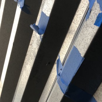 Devon Self Storage - Blue tape to cover the screws that are exposed to not be seen by new customers. - Self Storage Near Me - Apple Valley, California