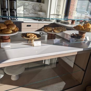ONA Cafe + Bakery - a display of baked goods - Bakeries Near Me - Lacombe, Alberta