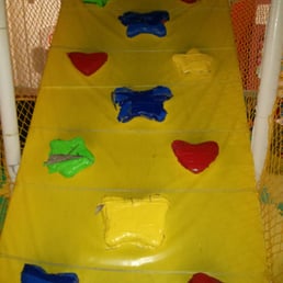 Ramp at beginning of the Castle. Duct-taped shapes provide nice soft foot holds, but look like they need some TLC Ramp at beginning of the Castle. Duct-taped shapes provide nice soft foot holds, but look like they need some TLC