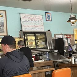Capri Restaurant - Specials and a view of the bar seats.