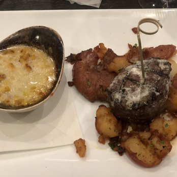 PIAF KITCHEN + WINE + BAR - Filet mignon on a bed of crispy potatoes and a side of cream corn. - Mediterranean Near Me - Grapevine, Texas PIAF KITCHEN + WINE + BAR - Filet mignon on a bed of crispy potatoes and a side of cream corn. - Mediterranean Near Me - Grapevine, Texas