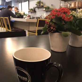 Squibb Coffee and Wine Bar - A touch of warmth in cool interior tones and materials - Coffee & Tea Near Me - Grand Rapids, Michigan Squibb Coffee and Wine Bar - A touch of warmth in cool interior tones and materials - Coffee & Tea Near Me - Grand Rapids, Michigan