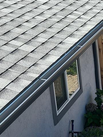 Slide of Zaguilan Roofing Service