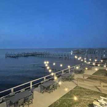 Jesse's On the Bay - View of the outdoor area overlooking the bay. - Steakhouses Near Me - Gulf Shores, Alabama