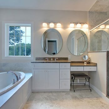 Morris Flooring & Design - a bathroom with a large tub - Flooring Near Me - North Canton, Ohio Morris Flooring & Design - a bathroom with a large tub - Flooring Near Me - North Canton, Ohio