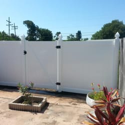 A & D Fencing and Carpentry - Installed along a concrete slab to close in the patio