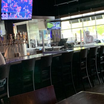 Yard House - Bae with clear barriers for social distancing - New American Near Me - Dallas, Texas Yard House - Bae with clear barriers for social distancing - New American Near Me - Dallas, Texas