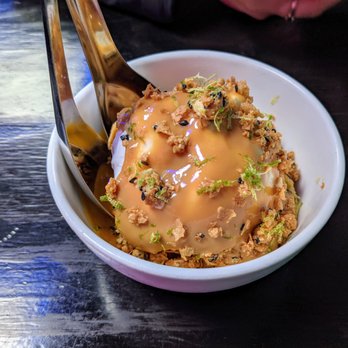 Takoi - I loved the coconut ice cream served with mango puree and caramel. It was topped with lime zest and an almond cereal-like crumb. - Thai Near Me - Detroit, Michigan Takoi - I loved the coconut ice cream served with mango puree and caramel. It was topped with lime zest and an almond cereal-like crumb. - Thai Near Me - Detroit, Michigan