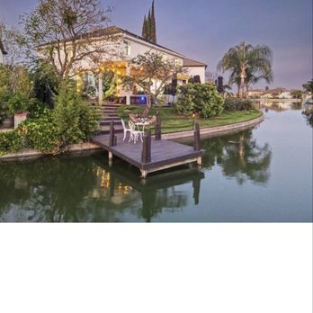 Grass Art Photography - A drone shot of my dock, my property and the outside of my house - Real Estate Photography Near Me