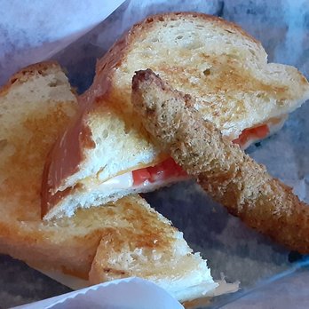 Russell Station Bar & Grill - Grilled cheese with added tomato, & a fried pickle (I asked for fresh, which Todd brought). Comes with choice of cheese. - Bars Near Me - Rochester, New York Russell Station Bar & Grill - Grilled cheese with added tomato, & a fried pickle (I asked for fresh, which Todd brought). Comes with choice of cheese. - Bars Near Me - Rochester, New York