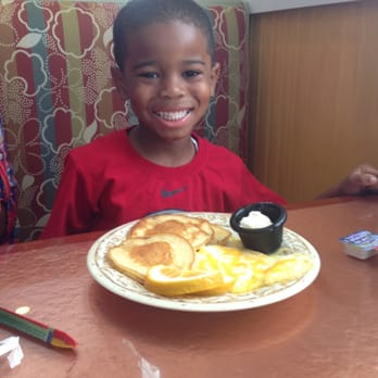 Another Broken Egg Cafe - Donovan's pancakes were awesome. - Cafes Near Me - Atlanta, Georgia