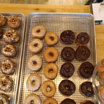 Vortex Doughnuts - Trying to avoid the case glare to show off thr tasty doughnuts. - Coffee & Tea Near Me - Asheville, North Carolina Vortex Doughnuts - Trying to avoid the case glare to show off thr tasty doughnuts. - Coffee & Tea Near Me - Asheville, North Carolina