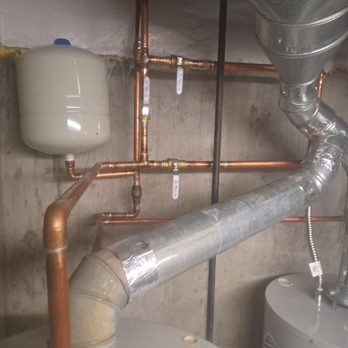 Over Time Plumbing Services - Piping of 2 water heaters in series together as well as paralle. - Plumbing Near Me Over Time Plumbing Services - Piping of 2 water heaters in series together as well as paralle. - Plumbing Near Me