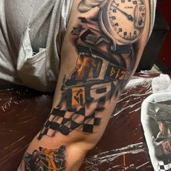 Ikonic Ink Tattoo & Piercing - Sleeve work started by Resident Artist: Evan Sutton