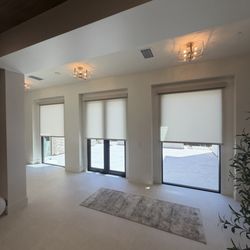 Cali Coast Shutters and Shades - Custom Motorized Roller Shades Half Open