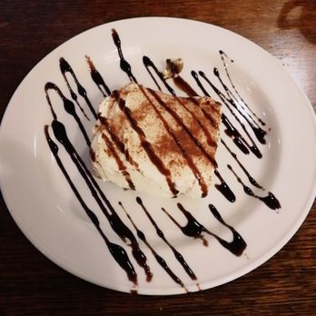 Dolce Restaurant - Tiramisu has a very great cream, but im not so into that wet squash cake below - Italian Near Me - Nottingham, NGM Dolce Restaurant - Tiramisu has a very great cream, but im not so into that wet squash cake below - Italian Near Me - Nottingham, NGM