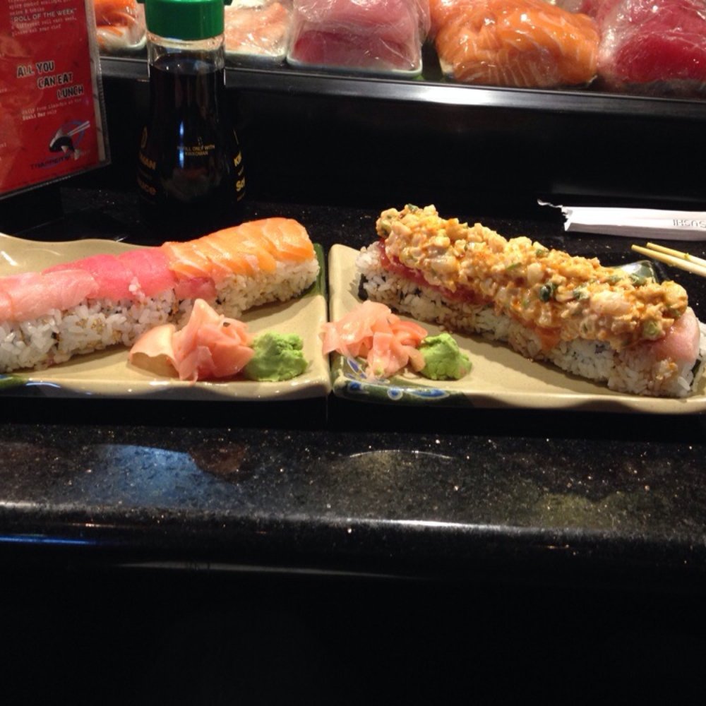 Trapper's Sushi - Rainbow roll left, Mt Rainier roll right. - Sushi Bars Near Me - Covington, Washington Trapper's Sushi - Rainbow roll left, Mt Rainier roll right. - Sushi Bars Near Me - Covington, Washington