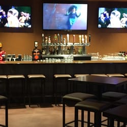 The Wild Game Entertainment Experience - Evergreen - Two bars with huge screens