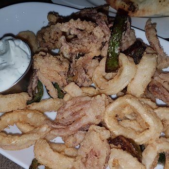 Mano's Restaurant & Lounge - Fluffy and Crispy Calamari with Tzatziki sauce - Lounges Near Me - Saskatoon, Saskatchewan Mano's Restaurant & Lounge - Fluffy and Crispy Calamari with Tzatziki sauce - Lounges Near Me - Saskatoon, Saskatchewan