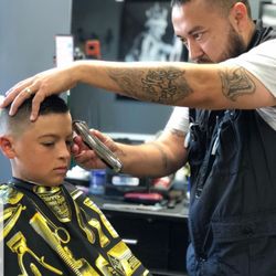Lookin' Good Barbershop & Salon - Shop owner of Lookin Good Barbershop Tyrone Chavez Call for appointments