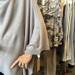 Trade Winds - Poncho worn asymmetrically   Great accent for the fall!