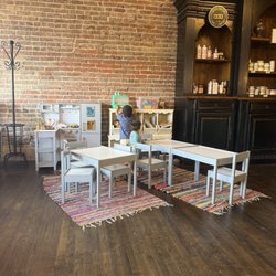 Woodsy floral & Coffee - This kids area was so good! From puzzles, play food, seating! One of the larger play areas in a coffee shop that I have seen!
