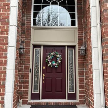 Home, Door & Window Products - The front door features a rich burgundy color with a traditional six-panel design. Accented by polished brass hardware. - Windows Installation Near Me - Berkley, Michigan Home, Door & Window Products - The front door features a rich burgundy color with a traditional six-panel design. Accented by polished brass hardware. - Windows Installation Near Me - Berkley, Michigan