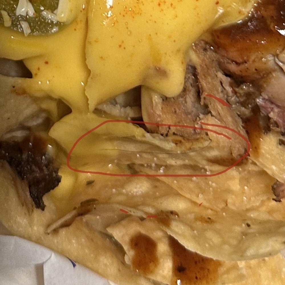 Central BBQ Southaven - Hair wrapped around the chip and covered in cheese - Barbeque Near Me - Southaven, Mississippi Central BBQ Southaven - Hair wrapped around the chip and covered in cheese - Barbeque Near Me - Southaven, Mississippi