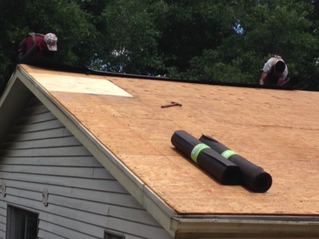 Slide of Ridge Masters Roofing