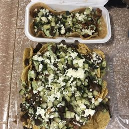 Spicy pork taco , bulgogi nachos and taco. Spicy pork taco , bulgogi nachos and taco.